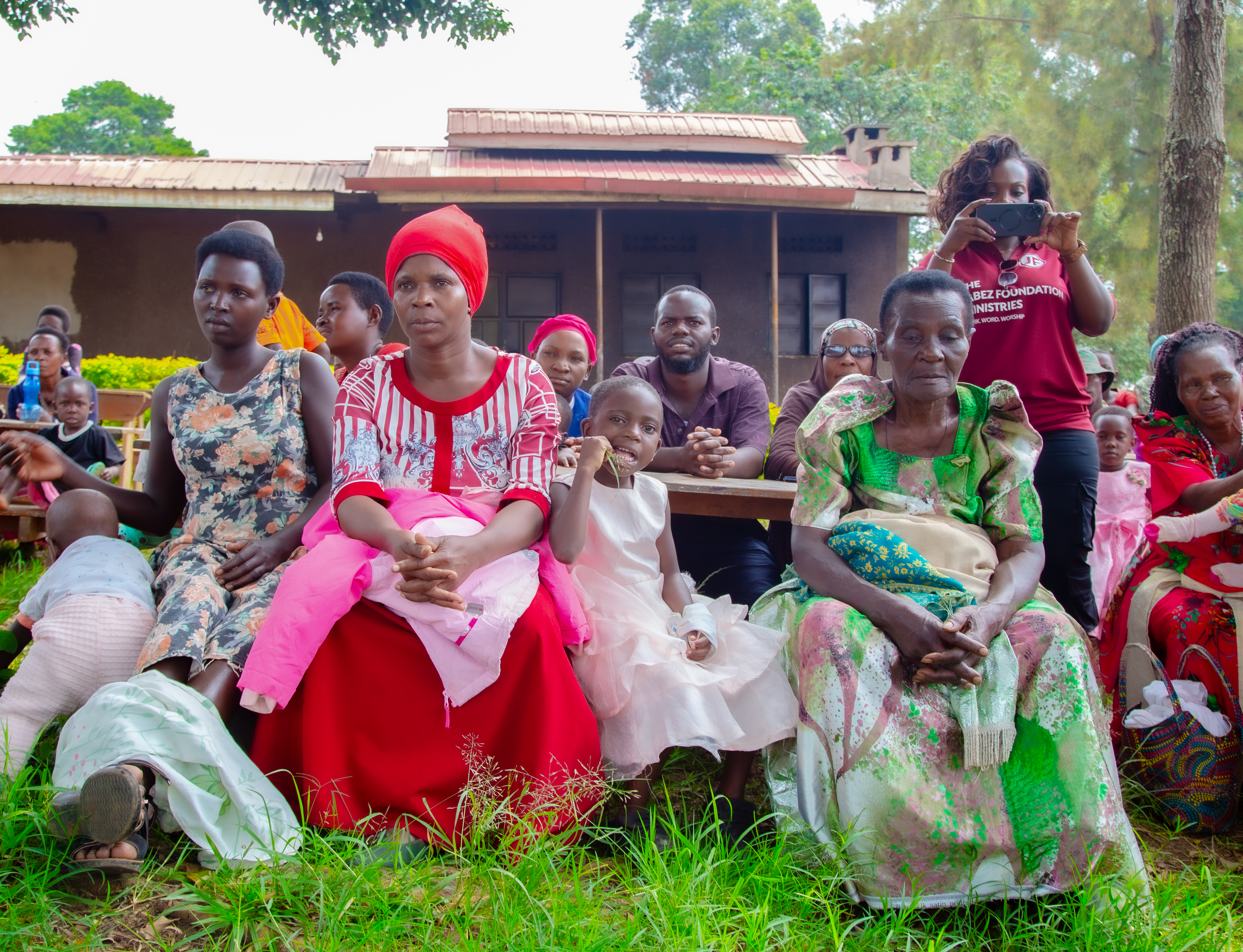 Families gathered during Jinja community outreach
